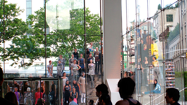 The womenswear models were arrayed on the pyramidal steps out front and had to stand and pose for a long time as people arrived.
