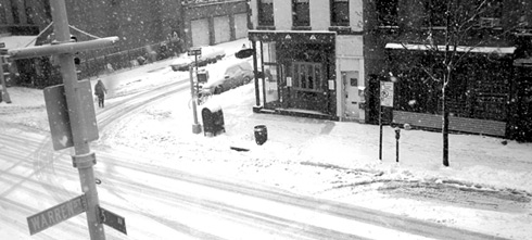 the corner of 5th avenue and prospect place, deserted in snow storm