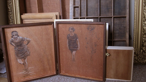 painting on a cigar box; oil and graphite on wood