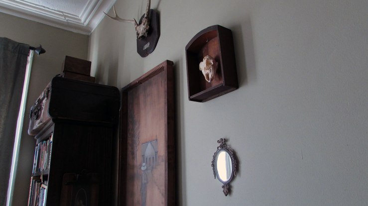 wall with skulls and art