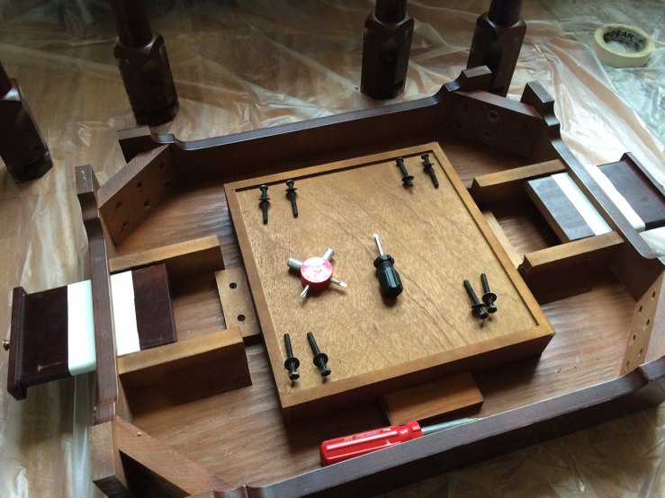 Bottom of the table, showing the beverage rest drawers and the inner section that holds game pieces