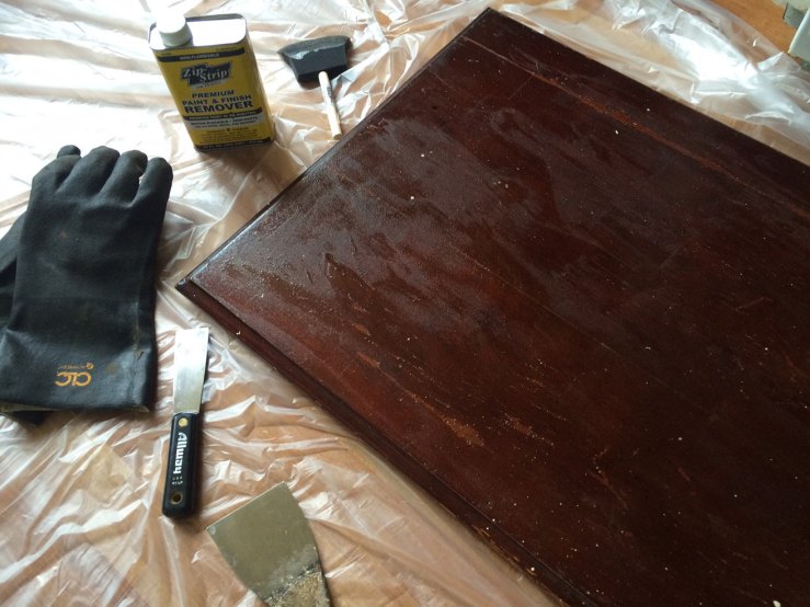 Table top slathered in first coat of streipper