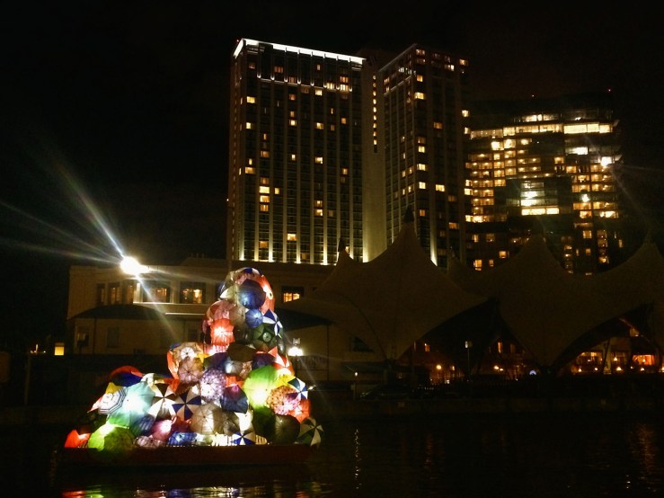 “Drift” by Stephanie Imbeau (illuminated umbrella boats)