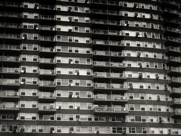 b&w photo of a building facade with many windows