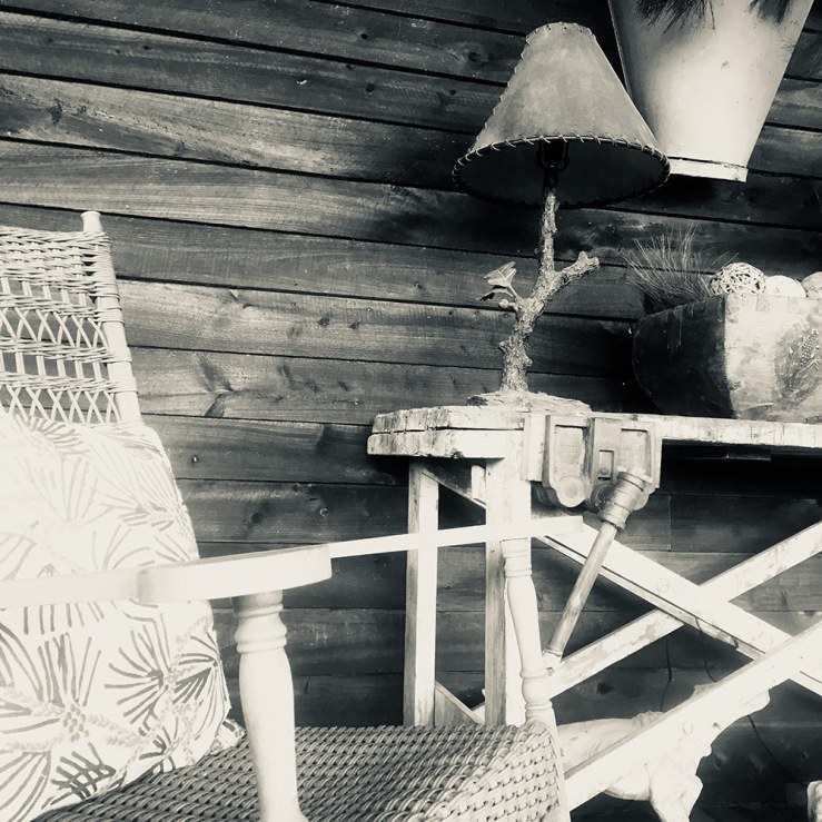 a rocking chair on the vast porch